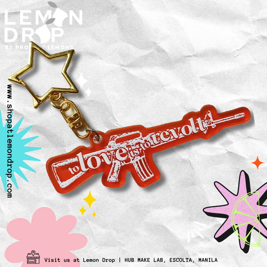 to love is to revolt keychain